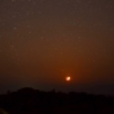 Waxing crescent Moon setting near Arasaig